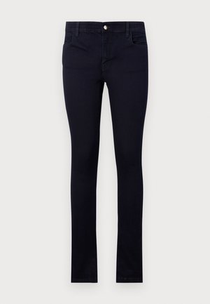 Navy blue jeans made of denim, featuring a slim fit design, five pockets, and a metal button closure at the waistband.