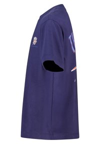 Purple cotton t-shirt with short sleeves, featuring a printed logo on the front and an emblem on the sleeve. Classic crew neck design.