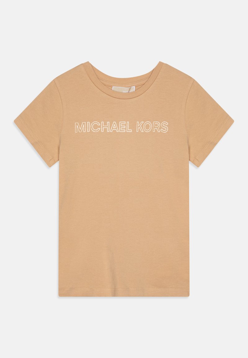 Beige cotton t-shirt with short sleeves and a crew neckline. Features white "MICHAEL KORS" text printed across the chest. Smooth texture.