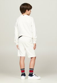Tommy Hilfiger MONOTYPE FLOCK REG  - Pantaloni sportivi - ancient white