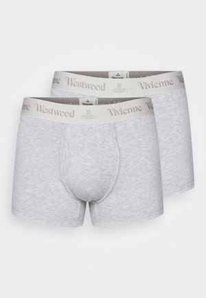 Pelēki kokvilnas bokseršorti ar mīkstu jostu, uz kuras vieglā pelēkā krāsā ir rakstīts "Westwood" un "Vivienne". Gluda tekstūra, standarta izmērs.