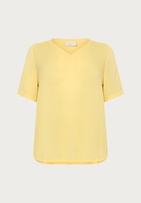 Blouse jaune à manches courtes avec un col en V et un ourlet cousu. Fabriquée en tissu léger avec une texture douce et un motif subtilement texturé.
