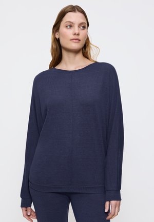 Marineblauw langemouwen top met een relaxte pasvorm, brede halslijn en ribgebreide manchetten, gemaakt van een gestructureerde, lichte stof.