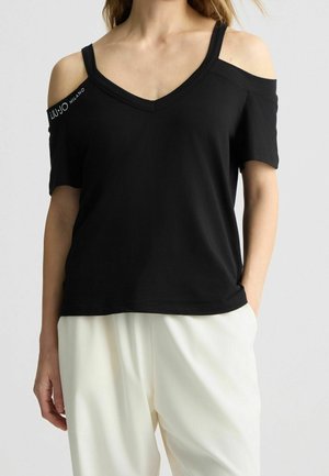 Schwarzes V-Ausschnitt-T-Shirt mit Cut-outs an den Schultern und kurzen Ärmeln. Mit "LIU-JO MILANO"-Logo auf der linken Schulter. Glatter Baumwollstoff.