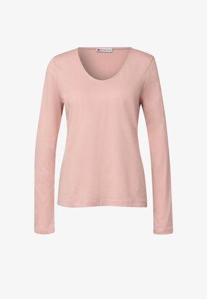 T-shirt à manches longues et col rond en rose clair, fabriqué en tissu doux, avec une coupe décontractée. L'étiquette à l'intérieur du col indique "Street One."