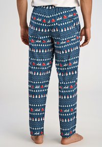 Navyblauwe pyjamabroek met een feestelijke print van sneeuwmannen, kerstbomen en sleeën; elastische tailleband; zachte stof; losse pasvorm.