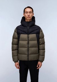 Puffer jacket in dark green and black, featuring a zip front, hood, and horizontal quilted sections. Sturdy fabric with textured insulation.