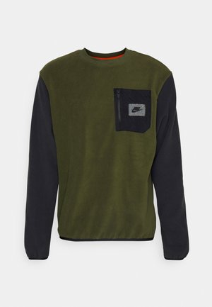 Fleece sweatshirt with an olive green body and black sleeves. Features a zippered pocket on the chest with a small logo patch. Round neckline.