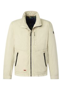 Light beige jacket with a zip closure, high collar, two zippered front pockets, and quilted detailing along the shoulders. Lined with patterned fabric.