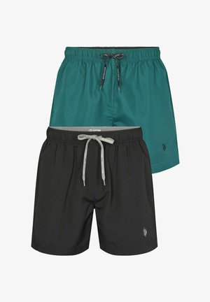 Zwarte zwembroek met een elastische tailleband, koord en zijvakken. Voorzien van subtiel logodetail op het linkerbeen.