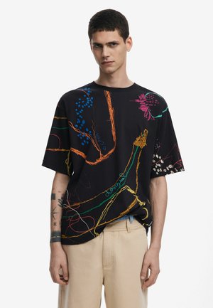 Black short-sleeve t-shirt featuring colorful abstract floral and line designs in orange, blue, green, pink, and white. Crew neck style.