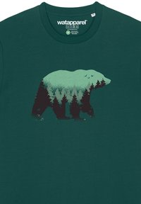 Groene katoen t-shirt met een silhouet van een beer, gevuld met een bospatroon, met ingewikkelde details en een ronde hals.