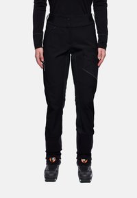 Zwarte skibroek met een matte afwerking, voorzien van een hoge tailleband, ritszakken en gevormde kniedetails voor een betere pasvorm en beweeglijkheid.