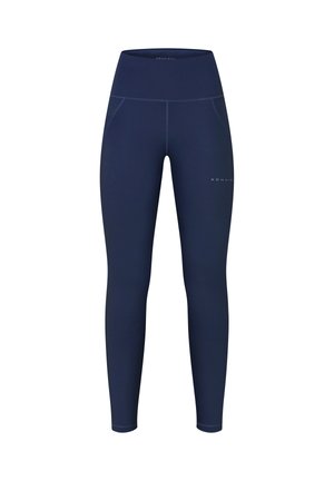 Granatowe legginsy z wysokim stanem wykonane z elastycznego materiału, z płaskimi szwami, dwoma bocznymi kieszeniami i detalem z logo na dolnej części nogawki.