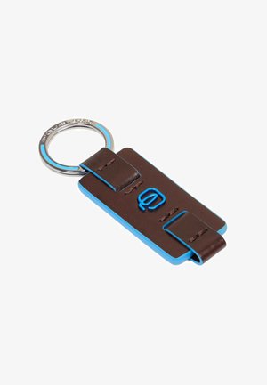 Brown leather keychain with a blue border, featuring a blue accent detail, metal ring, and strap design for attachment.