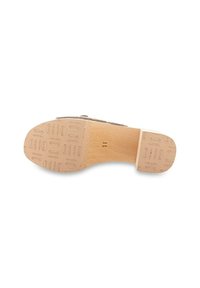 Korksåld sandal med en beige plattform som har en mönstrad gummiyttersula, slät bas och en subtil textur, utformad för komfort.