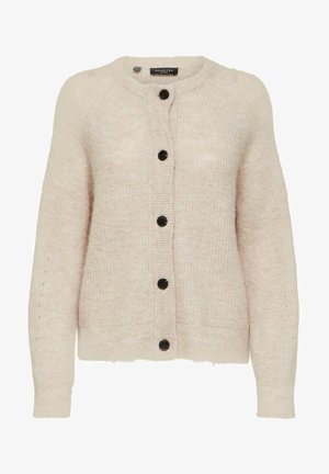 Light beige knitted cardigan with a round neckline, black buttons, and ribbed detailing on cuffs and hem. Soft, textured fabric.