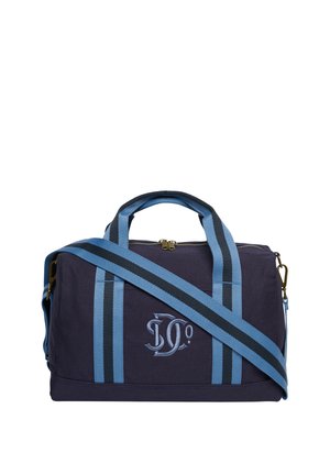 Navy blue fabric duffel bag with light blue and black striped handles and shoulder strap, embroidered monogram on front.