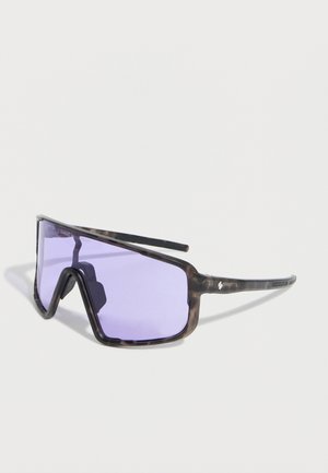 Sporty wraparound sunglasses with translucent tortoiseshell frame and single purple tinted lens, angled on a white background.