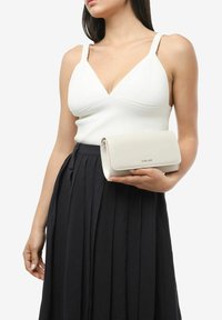 Miriade Pochette - bianco