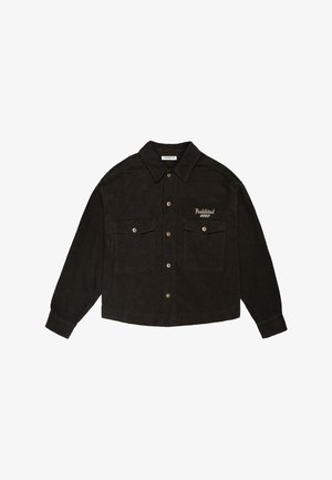 Ciemnobrązowa koszula sztruksowa na guziki z długimi rękawami, dwoma przednimi kieszeniami na patki oraz haftowanym napisem „Prohibited” na lewej piersi.