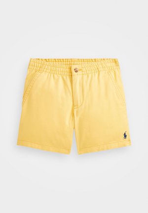 Gule småbørns shorts med elastisk linning, frontknaplukning, sidelommer og lille broderet marineblåt logo på venstre ben.