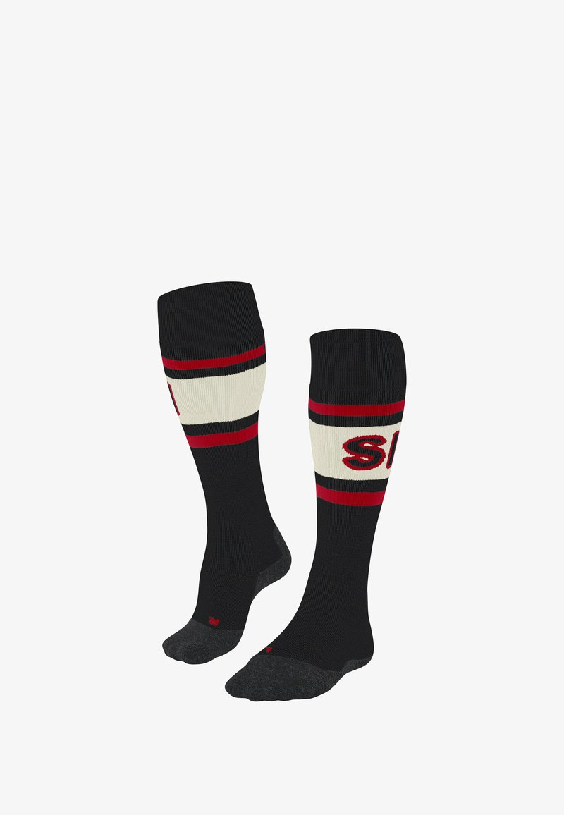 Calze nere fino al ginocchio con righe rosse e crema, dotate di una texture a costine e dettaglio del logo. Sezioni del tallone e delle dita rinforzate.