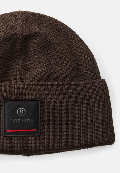 Brown knitted beanie with a textured finish, featuring a rectangular black patch labeled "FIRE+ICE" and a red accent stripe.