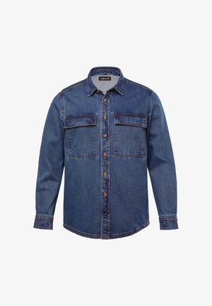 Koszula dżinsowa w ciemnoniebieskim kolorze. Posiada zapięcie na guziki, dwie kieszenie na piersiach z klapkami oraz kołnierzyk. Teksturowany materiał z przeszyciami.