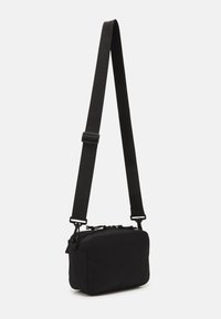 Mads Nørgaard TIAN FAE BAG UNISEX - Mala a tiracolo - black