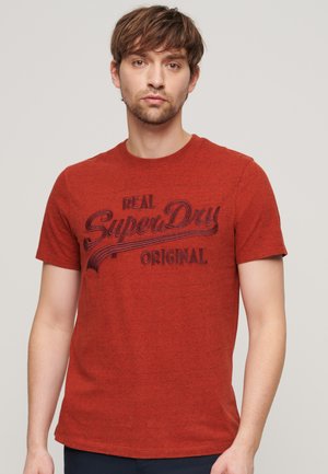 Moderna t-shirt firmata Tom Tailor con logo stampato sul
