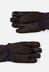 Swarte skinnhanskar med mjukt svart tyg på tumme och fingertoppar, med elastiskt handledsområde och justerbar spänne för en säker passform.