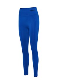 Blå leggings med høj talje, lavet af glat stof. Har subtile syningsdetaljer og en diskret logo ved taljen.