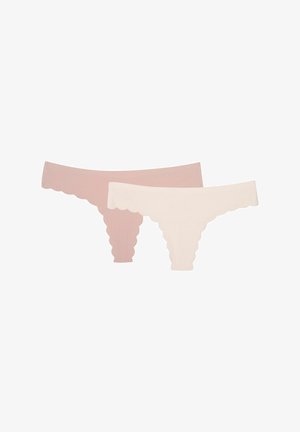 Dwie bezszwowe figi w stylu bikini z falistymi krawędziami, jedna w jasnobeżowym kolorze, druga w delikatnym różowym, wyświetlone na białym tle.