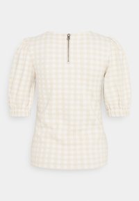 Top a maniche corte in tessuto a quadri crema e beige, con scollo rotondo e chiusura con zip sul retro con tirante metallico.