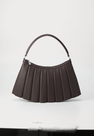 Dark brown pleated leather handbag with short curved handle and small crocodile logo near bottom left corner.