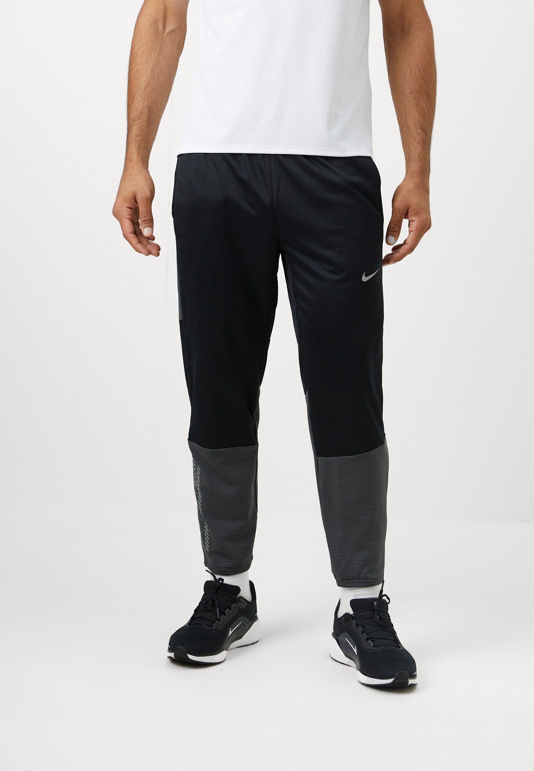 plain black nike tracksuit bottoms