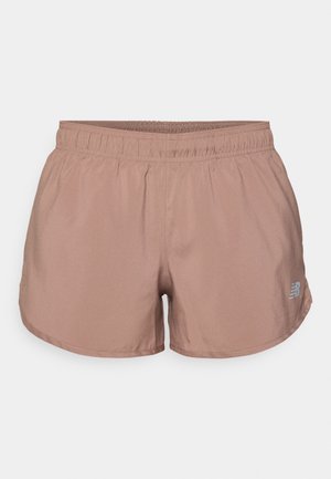 Light brown athletic shorts with an elastic waistband and a small reflective logo on the side. Made from a smooth, lightweight fabric.