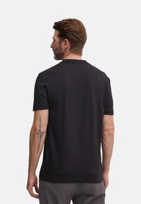 Calvin Klein Camiseta estampada - ck black