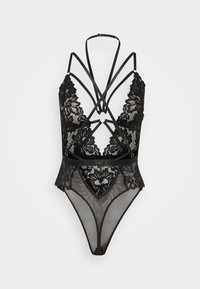 Μαύρο κορμάκι με δαντελένιες λεπτομέρειες, λεπτούς ελαστικούς ιμάντες, πλάτη από δίχτυ και λουλουδάτα μοτίβα. Σημαντική σχεδιαστική λεπτομέρεια αποτελεί το κεντρικό χρυσό στοιχείο.