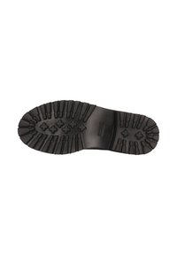 Suela de zapato de goma negra con patrones de tracción redondeados y barras horizontales elevadas. Tacón plano con una superficie lisa y detalle de marca.