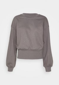 Felpa grigia in cotone con maniche lunghe e gonfie, scollatura rotonda e piccole decorazioni dorate sparse in tutto il capo. Orlo corto e polsini a coste.