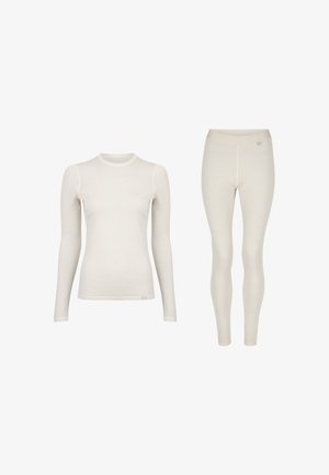 Kremowa termiczna bluzka z długim rękawem i dopasowane legginsy o miękkiej fakturze, z przylegającym krojem i minimalistycznym wykończeniem szwów.