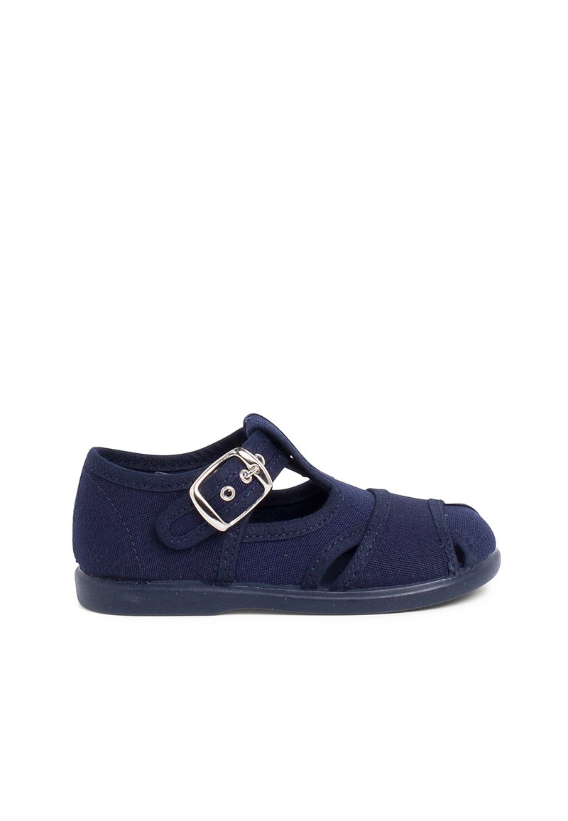 Navy blue canvas shoe with cutouts and a side buckle closure. Features a flexible rubber sole and reinforced stitching for durability.