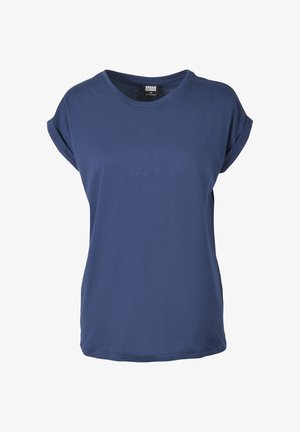 Sötétkék, rövid ujjú pamut póló. Kerek nyakkal és feltekert ujjakkal rendelkezik. Simaszerű textúrájú, lazán illeszkedő fazon.