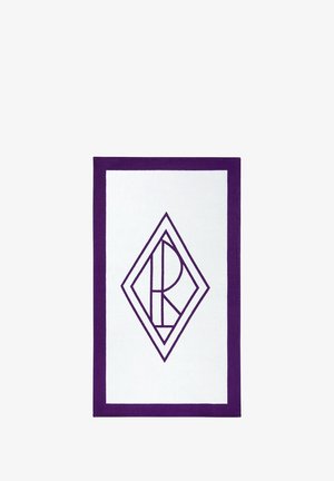White bath mat with a purple border featuring a diamond-shaped logo in the center. Material appears soft with a smooth texture.