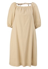 Abito in lino beige con scollatura quadrata e maniche a sbuffo. Caratterizzato da una chiusura con fiocco sul retro e una silhouette ampia, arriva fino al ginocchio.