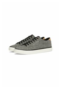 Gray textile sneakers with black laces, a white sole, and tan accents at the heel. Features a textured finish and minimalist design.