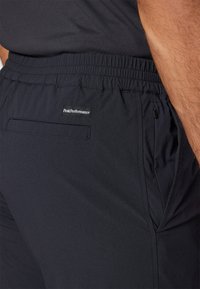 Peak Performance STRETCH DRAWSTRING PANT - Hlače za na prostem - black