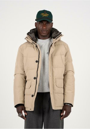 THE SWISS YUPPIE - Winterjas - sand
